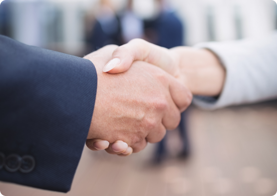 Business partnership handshake